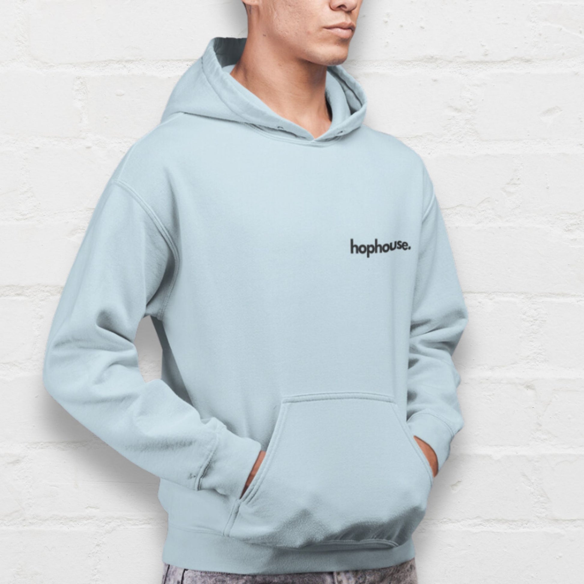 A man wearing a blue Hohouse hoodie