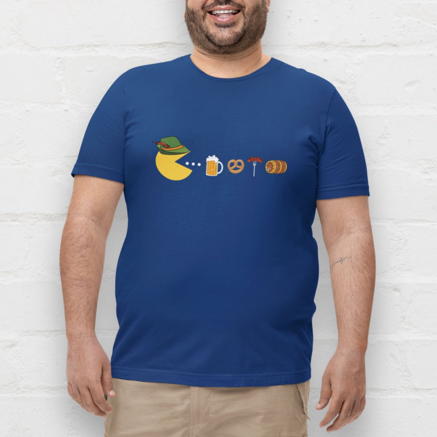 Man wearing a navy Bavarian Pacman shirt