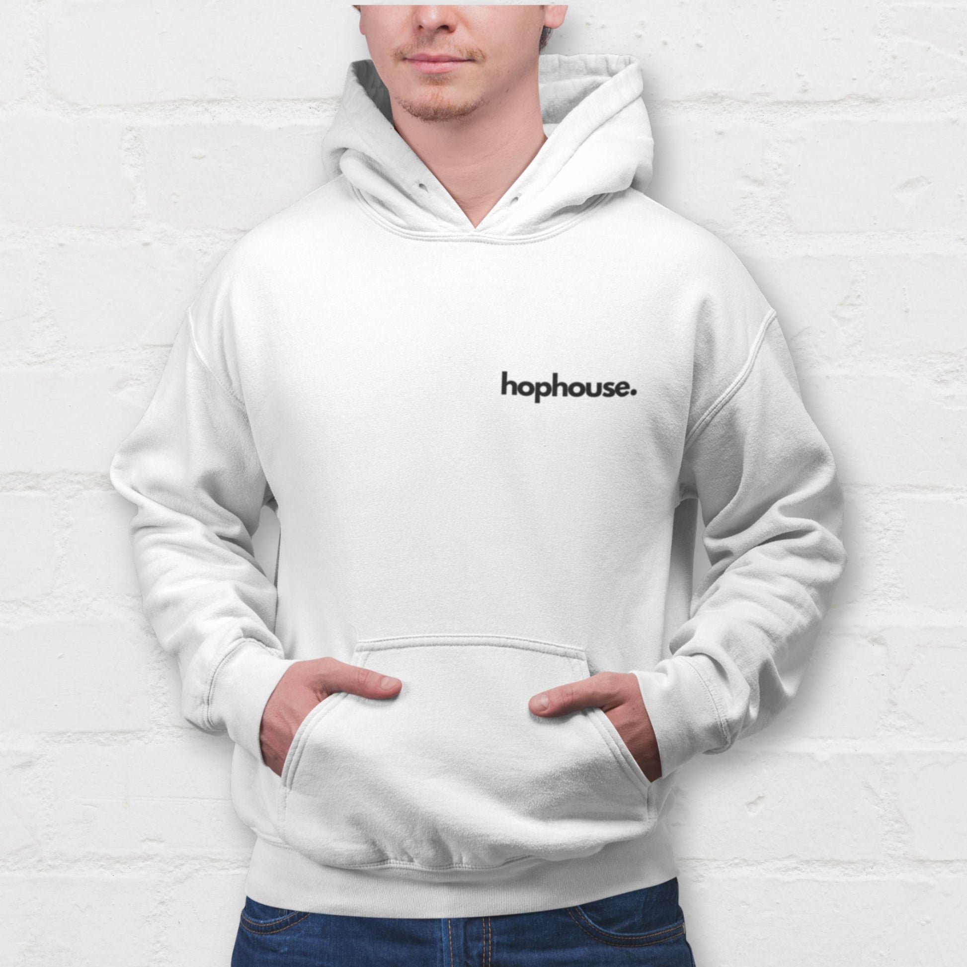 Man wearing a white Hophouse hoodie